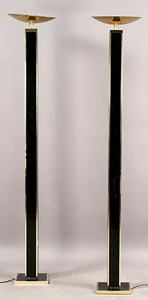 PAIR ART DECO BLACK LUCITE STANDING TORCHIERES: A pair of Art Deco style black lucite and brass standing torchieres attributed to Pierre Cardin circa 1970. Ht: 72" Width: 14"