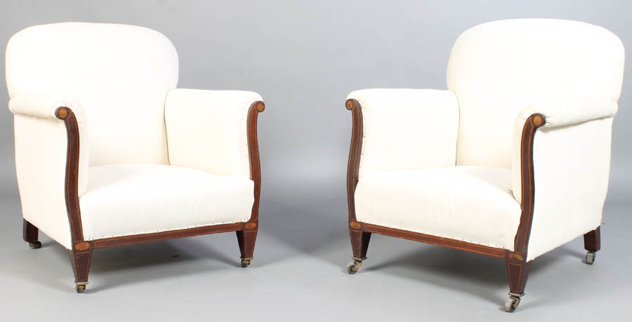 PAIR OF MAHOGANY EDWARDIAN CLUB CHAIRS 1910: A pair of mahogany Edwardian club chairs having line and fan inlay circa 1910. Recently recovered. Ensuite with the previous lot. Ht: 34" Width: 28" Depth: 27"