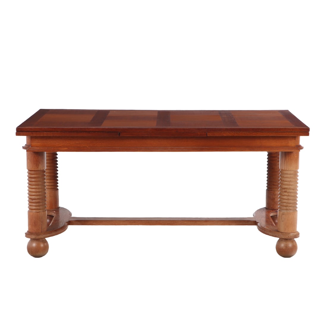 FRENCH OAK DINING OR LIBRARY TABLE HAVING PULL OUT LEAVES IN THE MANNER OF CHARLES DUDOUYT C 1960. (1 of 5)