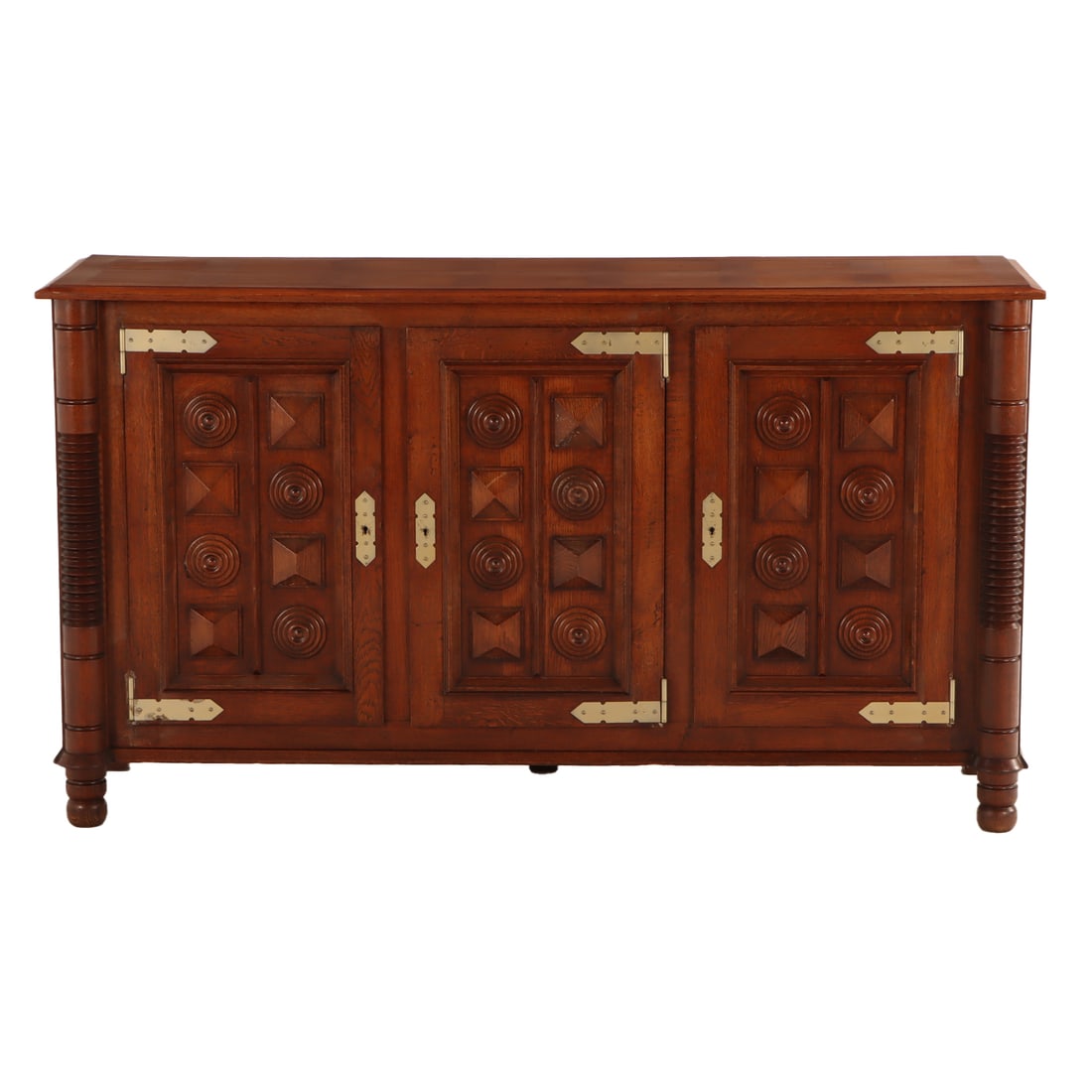 FRENCH OAK SIDEBOARD HAVING THREE DOORS OPENING TO FIVE DRAWERS AND GEOMETRIC MOTIFS IN THE MANNER (1 of 5)