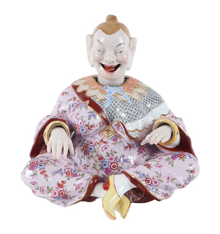A NINETEENTH CENTURY MEISSEN PORCELAIN NODDER FIGURE IN THE FORM OF A SEATED MALE. (1 of 9)