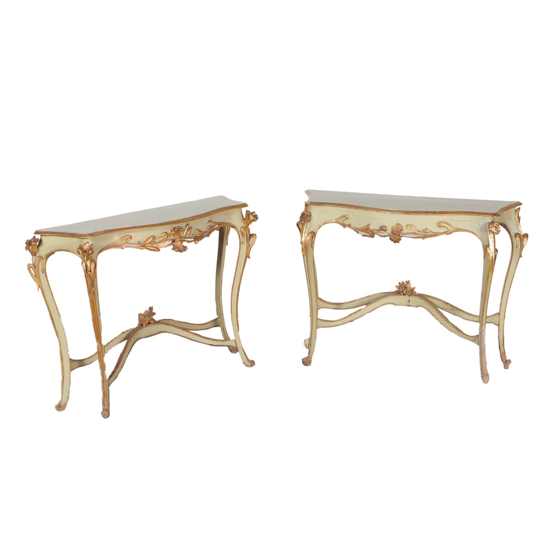 PAIR ITALIAN ART NOVEAU PAINTED AND GILTWOOD CONSOLE TABLES HAVING CARVED FLOWERS IN RELIEF C: Pair Italian Art Noveau painted and giltwood console tables having carved flowers in relief C 1900. Ht: 36.5" Wd: 52" Dpth: 16"