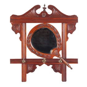 CARVED EASTLAKE VICTORIAN MAHOGANY WALL MIRROR WITH HAT HOOKS C 1880