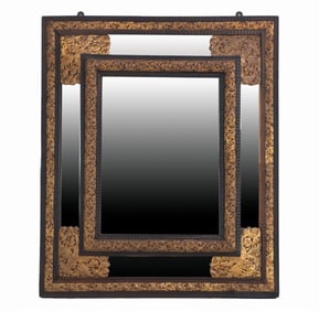 A DUTCH REPOUSSE NINETEENTH CENTURY BRASS AND WOOD MIRROR.