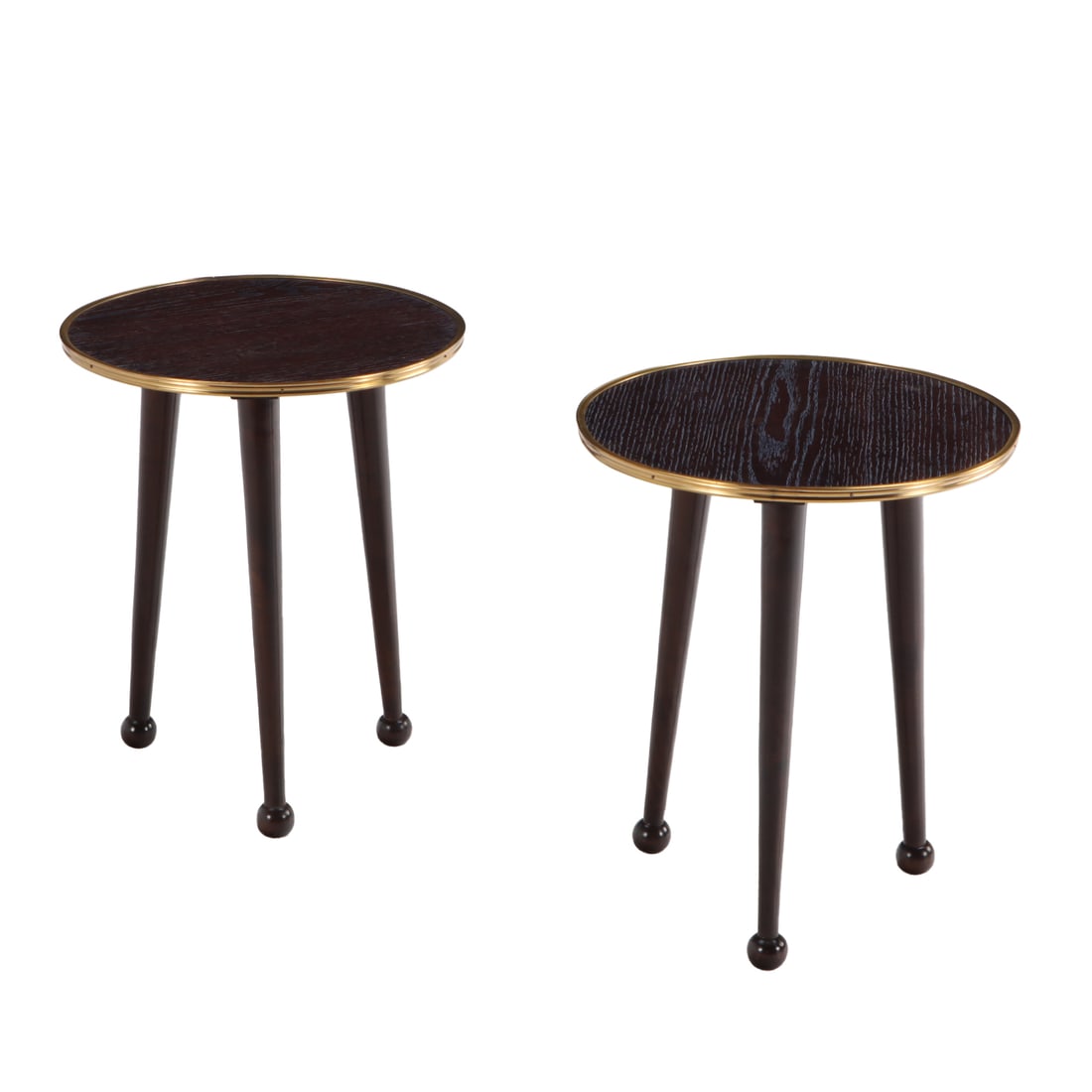 PAIR OF DARK CERUSED OAK AND BRASS END TABLES WITH BALL FEET IN THE MANNER OF JEAN ROYERE.