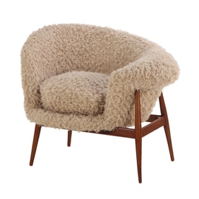 ASYMMETRIC LOUNGE CHAIR IN THE MANNER OF JEAN ROYERE UPHOLSTERED IN FAUX SHEEP SKIN.