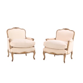 PAIR PAINTED AND GILT LOUIS XV STYLE UPHOLSTERED BERGERE CHAIRS C 1920 HAVING NEW FABRIC.