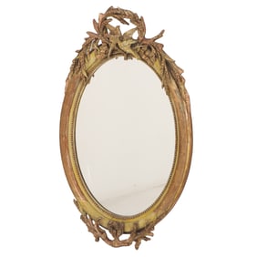 OVAL GILTWOOD AND GESSO FRENCH MIRROR WITH LOVE BIRD MOTIF C 1900.