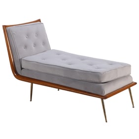 MAHOGANY CHAISE LOUNGE HAVING BRASS FEET AND RECENT FABRIC IN THE MANNER OF ROBSJOHN-GIBBINGS.