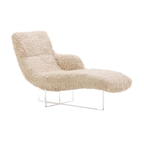 FAUX SHEEP SKIN CHAISE LOUNGE ON A LUCITE BASE IN THE MANNER OF KAGAN.
