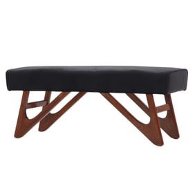 WALNUT AND UPHOLSTERED BENCH IN THE MANNER OF VLADIMIR KAGAN.