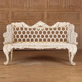 PAINTED CAST IRON "ROSE GARDEN" BENCH HAVING INVERTED HORSE SHOES.
