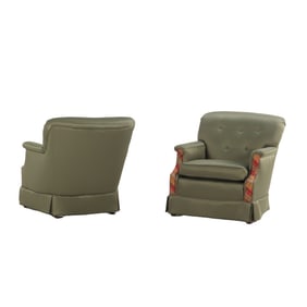 PAIR OF UPHOLSTERED CLUB CHAIRS DONE IN A SILK LIKE FABRIC.