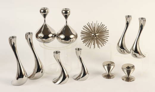 A LOT OF ELEVEN MODERN CHROME DECORATIVE ITEMS CIRCA 1980S: A lot of eleven modern chrome decorative items circa 1980s Including six George Jensen "Cobra" candlesticks, two Robert Welch candlesticks, two Swid Powell candlesticks and a Kelly Wearstler Sputnik s