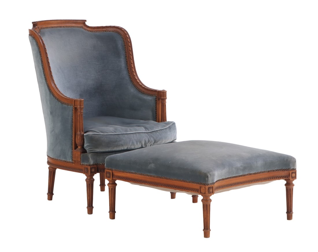 FRENCH LOUIS XVI STYLE CARVED AND UPHOLSTERED BERGERE CHAIR WITH CONFORMING STOOL C 1920. (1 of 8)