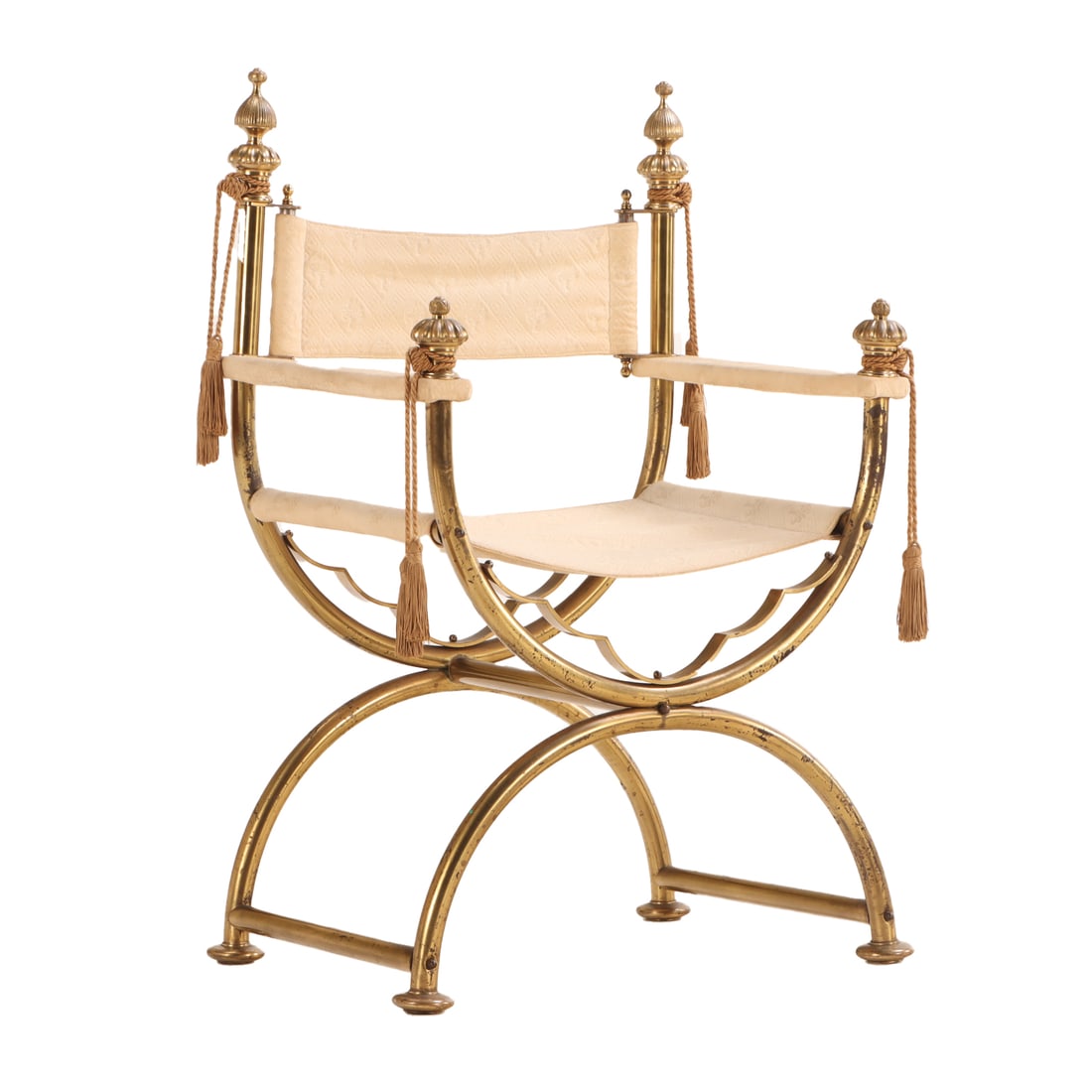 BRASS CERULE FORM ARM CHAIR HAVING UPHOLSTERED SEAT AND BACK AND FINIAL DECORATIONS C 1930. (1 of 5)