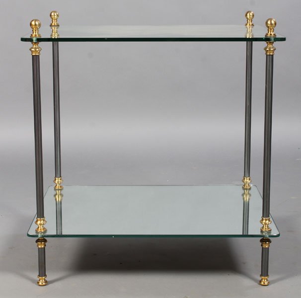 DECORATED BRASS AND METAL OCCASIONAL TABLE: A good French bronze and steel decorated brass and metal occasional table having a glass top over mirrored shelf circa 1940. Ht: 27.5" Width: 27.5" Depth: 19.75"