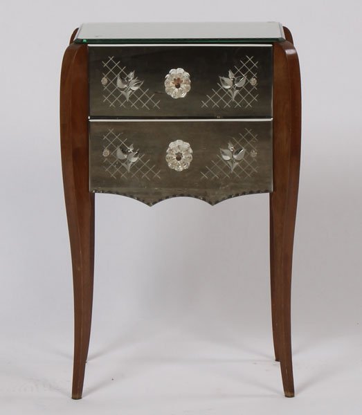 SINGLE MIRRORED SIDE TABLE ETCHED: A single mirrored side table having faceted edge top over two etched mirrored front drawers supported on shaped legs circa 1950. Ht: 27" Width: 18" Depth: 13.5"