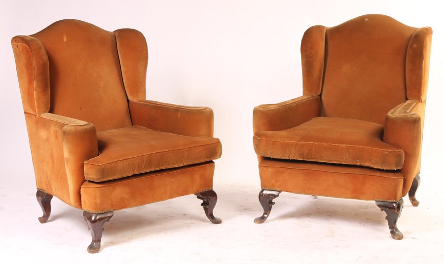 PAIR QUEEN ANNE WING CHAIRS PAD FEET: A pair of Queen Anne style wing chairs having bracket form legs and pad feet circa 1890. Ht: 41" Width: 34.5" Depth: 35"