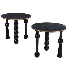 A PAIR OF DARK CERUSED OAK END TABLES WITH ASYMMETRIC BASE IN THE MANNER OF CHARLES DUDOUYT