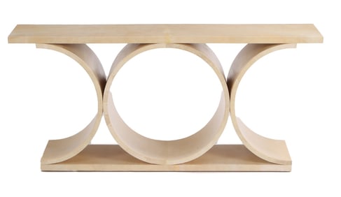 ONE OF TWO PARCHMENT COVERED CONSOLE TABLES HAVING CIRCULAR DESIGN IN THE MANNER OF KARL SPRINGER.