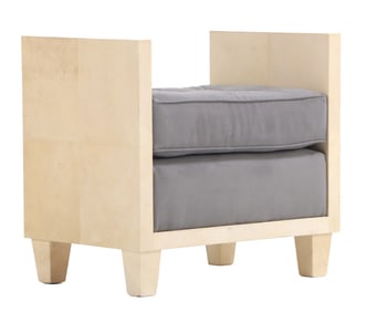 ONE OF TWO PARCHMENT COVERED AND UPHOLSTERED BENCHES IN THE MANNER OF JEAN-MICHEL FRANK.