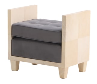 ONE OF TWO PARCHMENT COVERED AND UPHOLSTERED BENCHES IN THE MANNER OF JEAN-MICHEL FRANK.