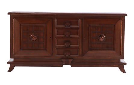 FRENCH OAK SIDEBOARD HAVING TWO DOORS WITH COPPER BALLS FLANKING FOUR DRAWERS IN THE MANNER OF