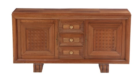 FRENCH OAK SIDEBOARD IN THE MANNER OF CHARLES DUDOUYT C 1940 HAVING TWO DOORS AND THREE DRAWERS.