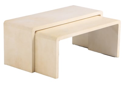 A TWO PIECE SET OF PARCHMENT COVERED NESTING TABLES IN THE MANNER OF JEAN-MICHEL FRANK.