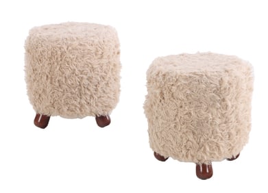 PAIR OF FAUX FUR UPHOLSTERED STOOLS IN THE MANNER OF JEAN ROYERE HAVING WOODEN FEET.