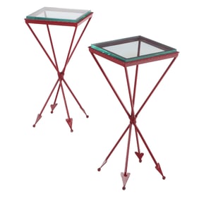 PAIR OF PAINTED IRON DRINKS  TABLES HAVING THICK GLASS TOPS AND ARROW FORM FEET.