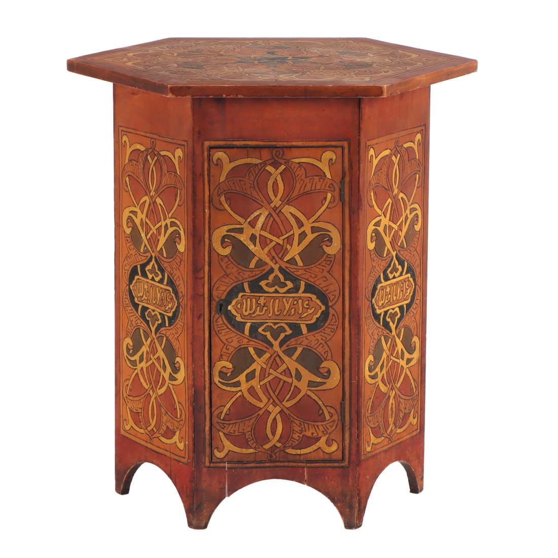 ARABESQUE POKER WORK HEXAGONAL OCCASIONAL TABLE HAVING A SINGLE DOOR C 1910. (1 of 5)
