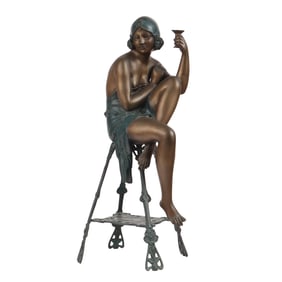 AN ART DECO BRONZE STATUE AFTER FERDINADO DE LUCA DEPICTING A SEATED WOMAN, SIGNED F. DE PIETRO