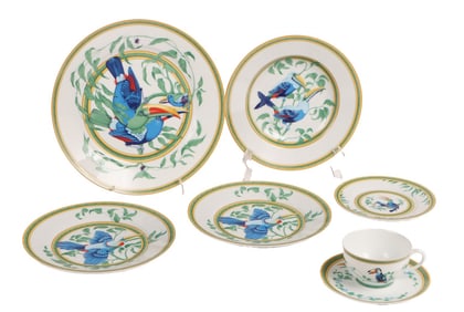 7 PCS HERMES "TOUCANS" INCLUDING DINNER AND BREAD PLATE, 2 SALAD PLATES, BOWL, AND CUP WITH SAUCER