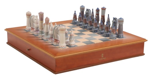 LLADRO MEDIEVAL CHESS SET INCLUDING CHESSBOARD CASE AND 32 PORCELAIN PIECES C. 1990S