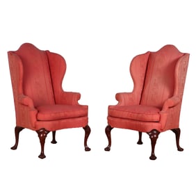 A STATELY PAIR OF MAHOGANY WING CHAIRS HAVING FLORAL UPHOLSTERY WITH BIRDS AND RESTING ON