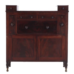 AMERICAN CROTCH MAHOGANY BUTLERS DESK HAVING A FALL FRONT DESK OVER TWO DRAWERS OPENING TO