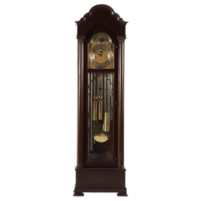 AN EARLY 20TH CENTURY MAHOGANY TALL CASE CLOCK HAVING NINE TUBES AND THREE WEIGHTS.