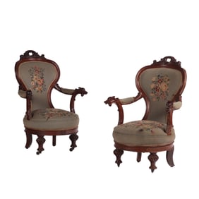 LARGE PAIR OF CARVED VICTORIAN OPEN ARM CHAIRS HAVING ANIMAL HEAD TERMINALS AND NEEDLEPOINT