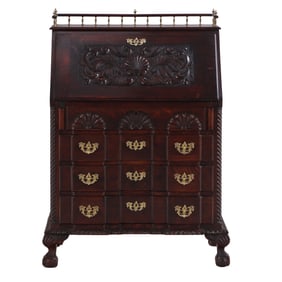 AMERICAN LATE VICTORIAN SHELL CARVED OAK SLANT LID DESK RESTING ON BALL AND CLAW FEET.