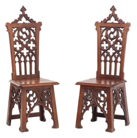 PAIR OF CARVED GOTHIC REVIVAL SIDE CHAIRS C 1880 HAVING PIERCED CARVED BACKS.