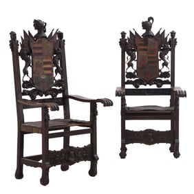 LARGE PAIR OF CONTINENTAL FIGURAL CARVED WALNUT ARM CHAIRS WITH LEATHER SEATS C 1880.