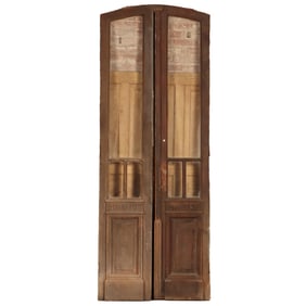 PAIR WALNUT ARCHED TOP ENTRY DOORS WITH GLASS PANELS C 1890.