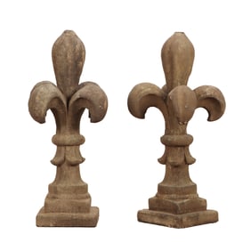 PAIR OF CAST STONE FLEUR DE LIS.