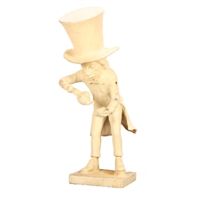 CAST IRON GARDEN FIGURE DEPICTING THE MAD HATTER.