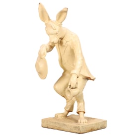 CAST IRON GARDEN FIGURE DEPICTING A RABIT HOLDING A HAT..