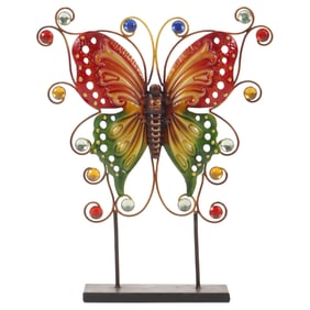 A PAINTED METAL TOLEWARE BUTTERFLY SCULPTURE.