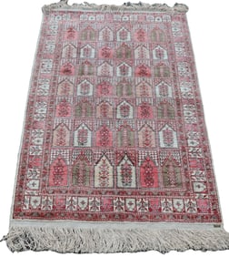 AN INDO ART SILK RUG 48" X 32" C. LATE 20TH CENTURY.