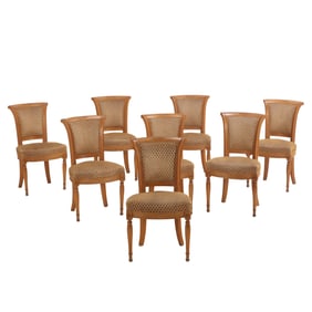 AN UNUSUAL SET OF EIGHT FRENCH DIRECTOIRE STYLE UPHOLSTERED DINING CHAIRS HAVING A TAPERED BACK